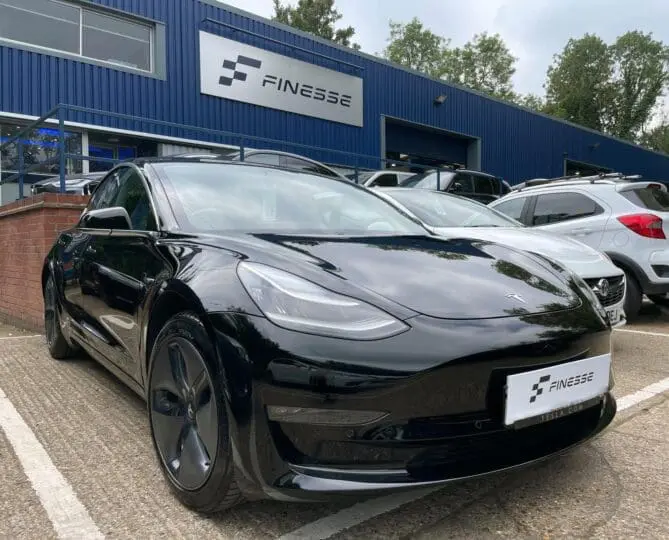 Finesse | Image of a Tesla
