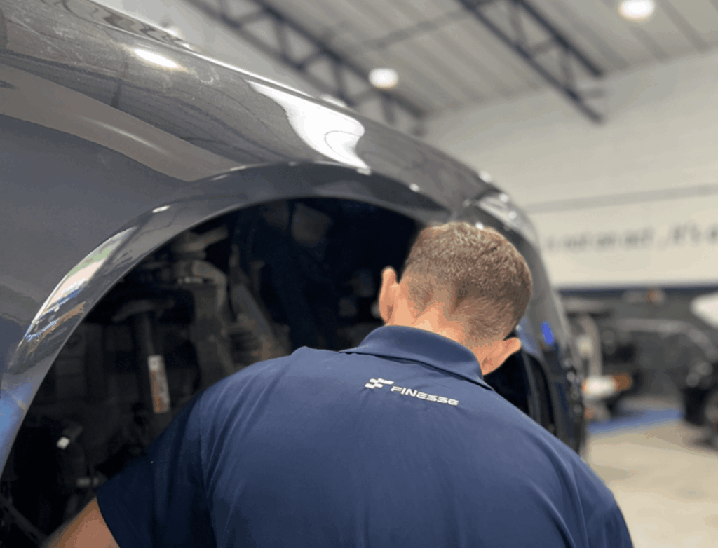 Image technician repair a car at Finesse Redhill