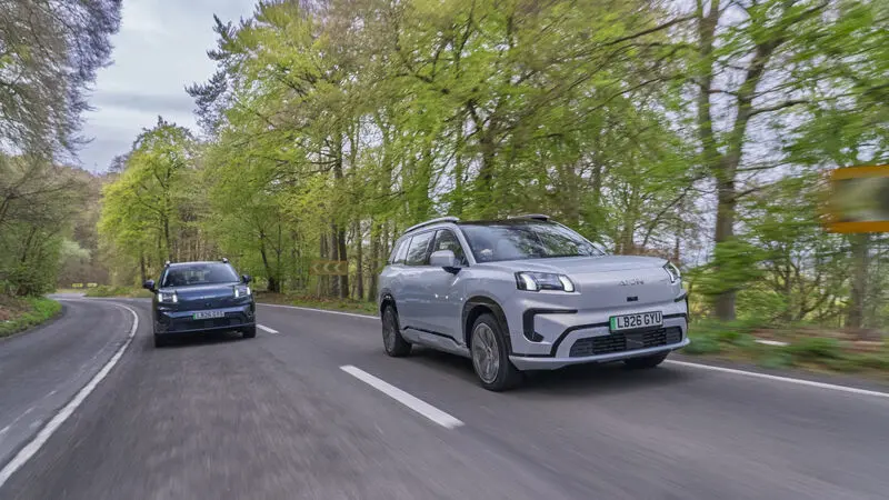 Two AION vehicles on the road
