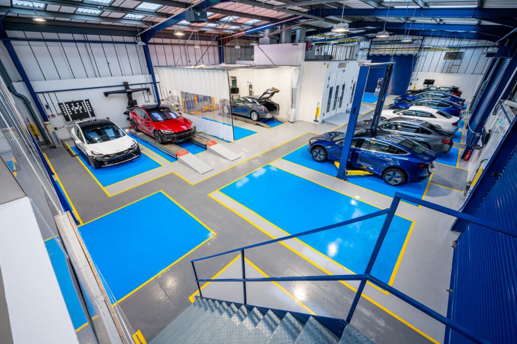 The image shows cars at Finesse ARC Bodyshop