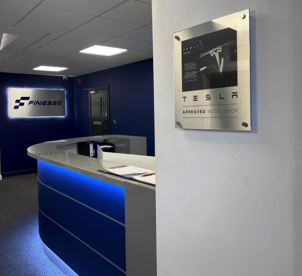 finessse Tesla electric vehicle at Finesse body shop.